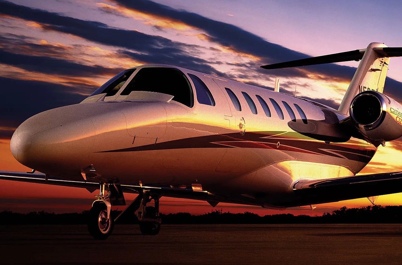Cessna Citation CJ2+ jet aircraft on runway at sunset - CJ2+ market report The Jet Agent